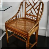 F73. One of a pair of Chinese Chippendale chairs with caned seats.  